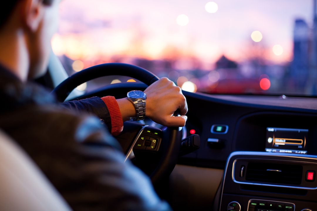 Driver reviewing SR-22 insurance certificate and auto insurance policy documents